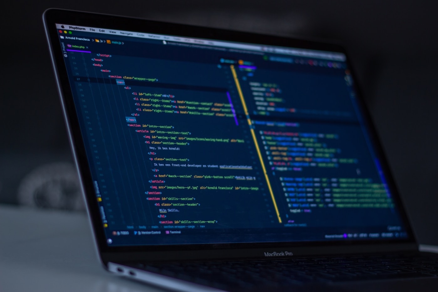 Laptop screen showing source code in an editor, the Agent SSH cover image.